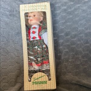Seymour Mann Collectible Doll with Red and Green Outfit